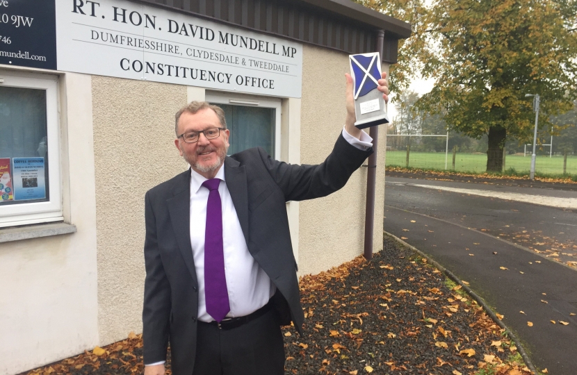David celebrating at his constituency office in Moffat with his award