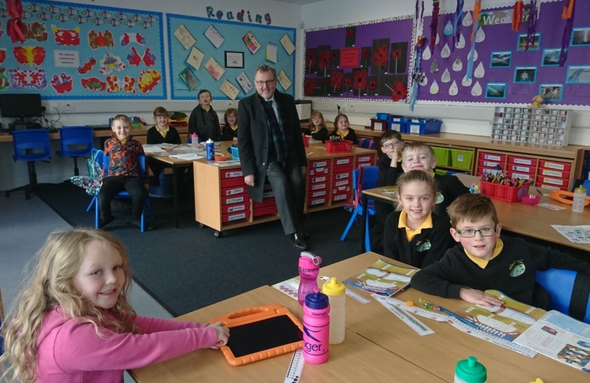 David with pupils at the new Abington Primary