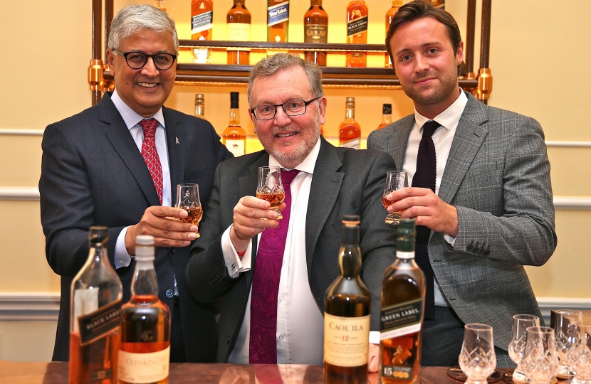 David Mundell at the Scotland Office in London hosting an event promoting the Scottish whisky industry during his period as Secretary of State. The Dumfriesshire, Clydesdale and Tweeddale MP is pictured with senior representatives of spirits company Diageo