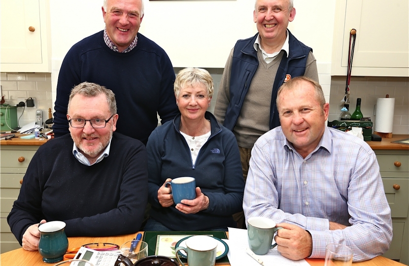 FARM VISIT   . . . local MP David Mundell, front left, arranged a meeting two years ago between New Zealand agricultural Trade Envoy Mike Peterson, front right, and hill farmers in his constituency