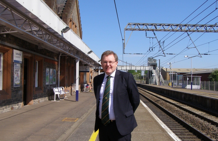 David Mundell campaigns for better train services through Lockerbie