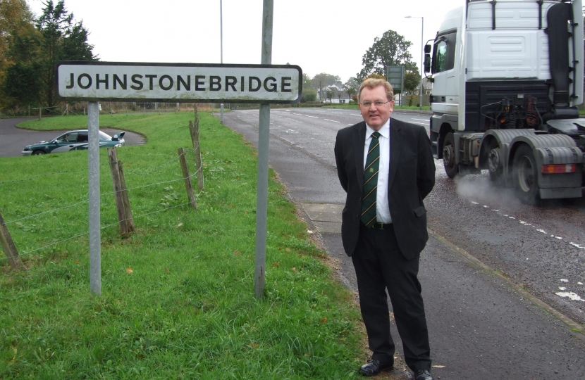 David Mundell checks out the busy road in Johnstonebridge