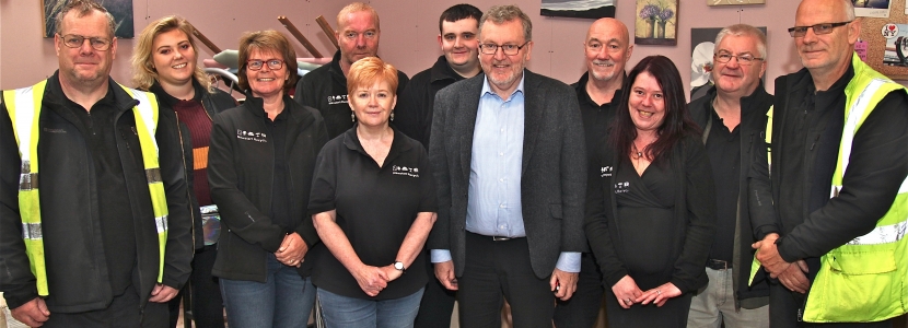 Local MP and Scottish Secretary David Mundell, seventh from left, meets staff and volunteers at Newstart Recycle's new premises in Annan.   