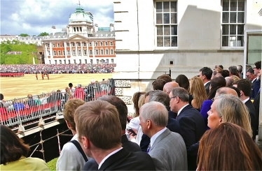 guests watch the Trooping of the Colour from the Scotland Office overlooking Horse Guards Parade