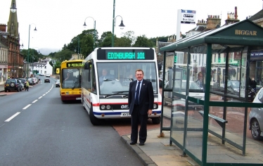 David Mundell considers one transport option, a bus from Biggar