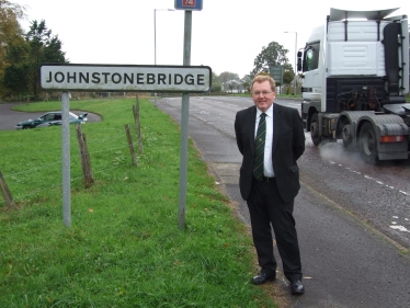 David Mundell checks out the busy road in Johnstonebridge